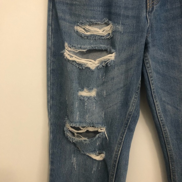 We The Free Regular High Rise Distressed Light Wash Raw Hem Button Fly Jeans - Picture 4 of 8